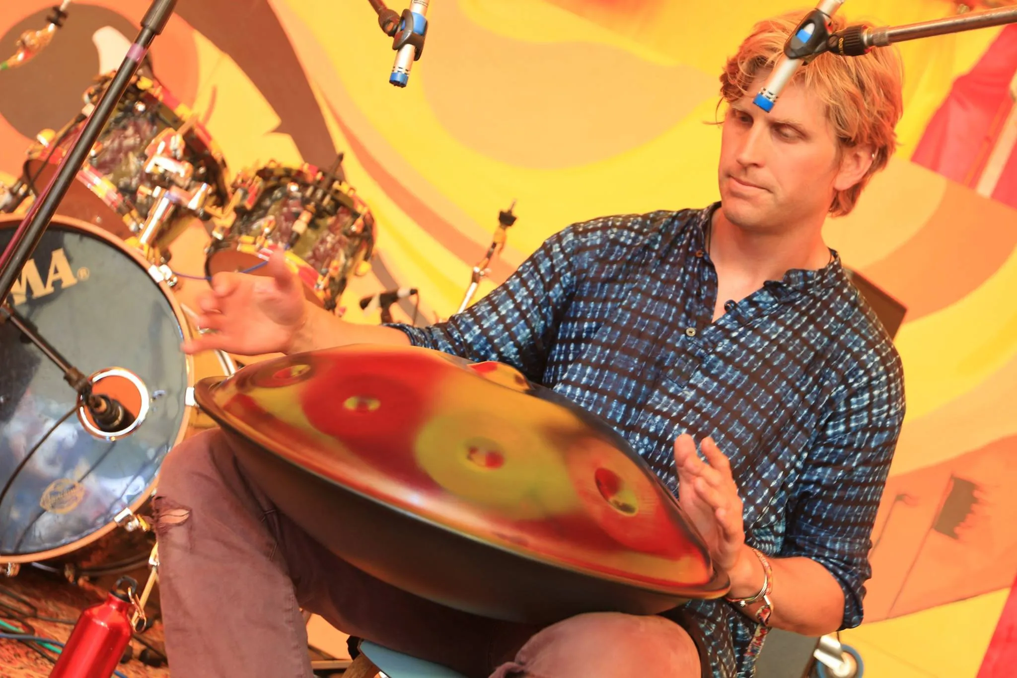 Blake performing on handpan